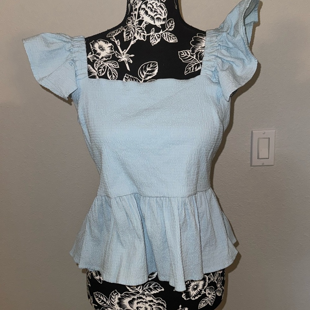 Blue top with open back